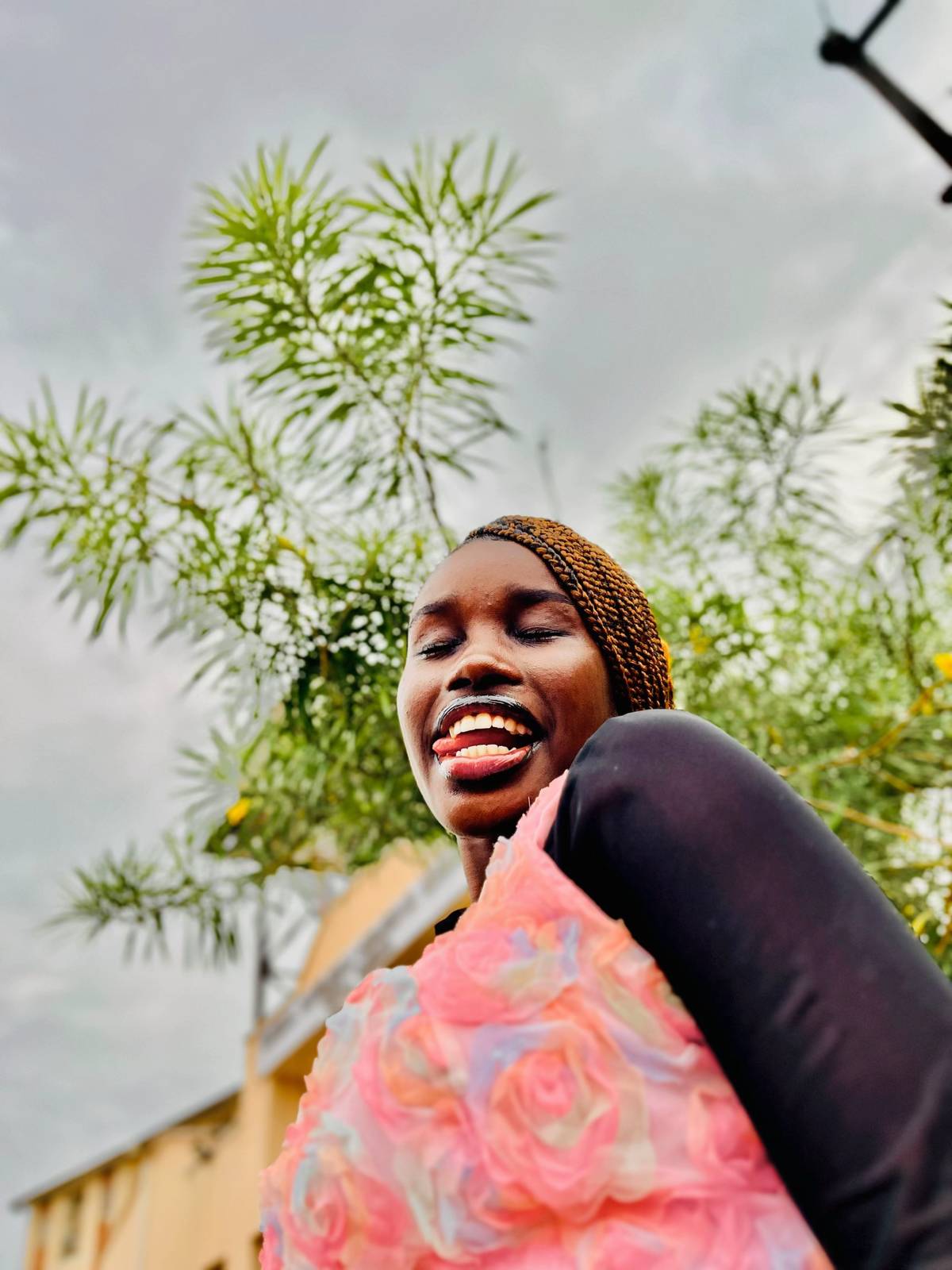 Woman Laughing with Pink Fabric